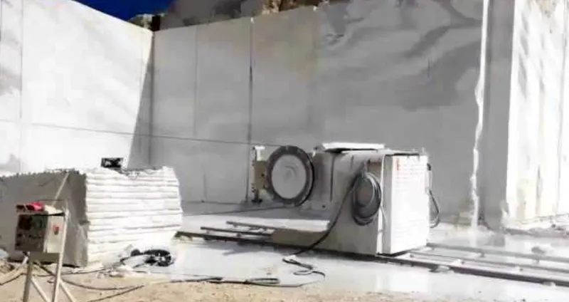 Diamond wire saw working in a stone mine Diamond wire saw working in a stone mine